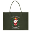 a green shopping bag with a santa clause on it