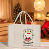 a white shopping bag with a santa clause on it