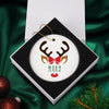 a christmas ornament with a reindeer's head on it