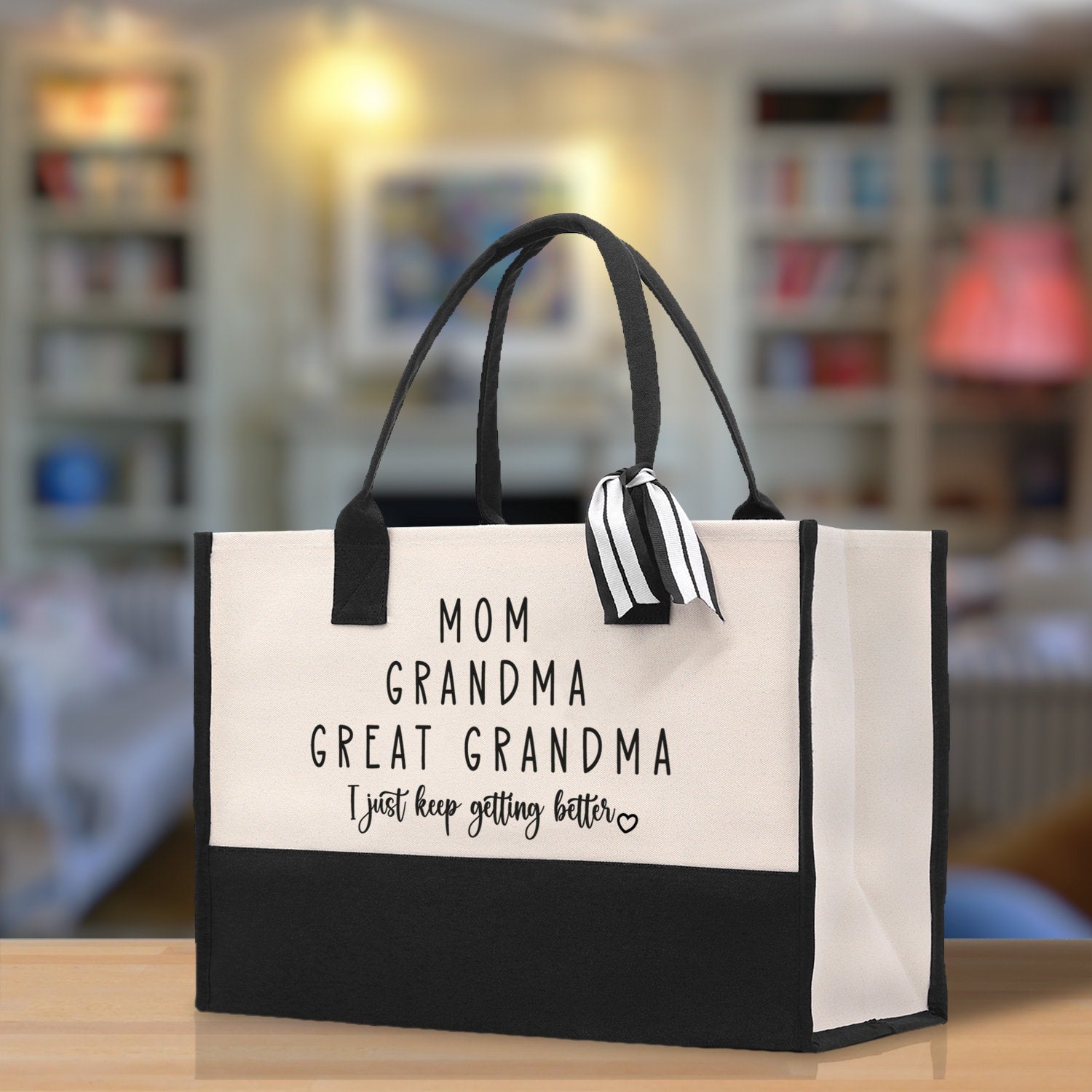 a black and white bag with a mom&#39;s grandma&#39;s message on it