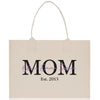 a white bag with the word mom on it