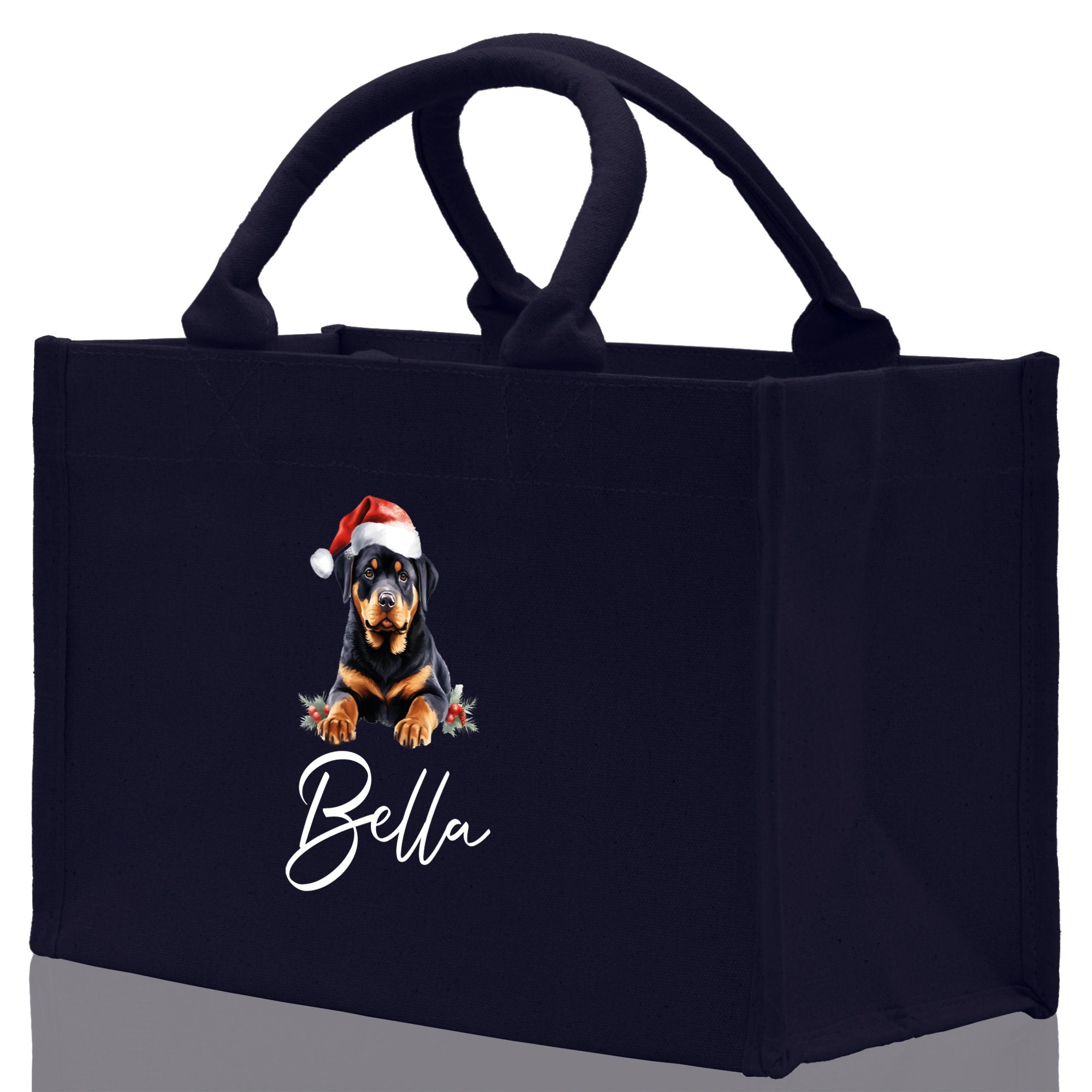 a black shopping bag with a picture of a dog wearing a santa hat