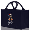 a black shopping bag with a picture of a dog wearing a santa hat