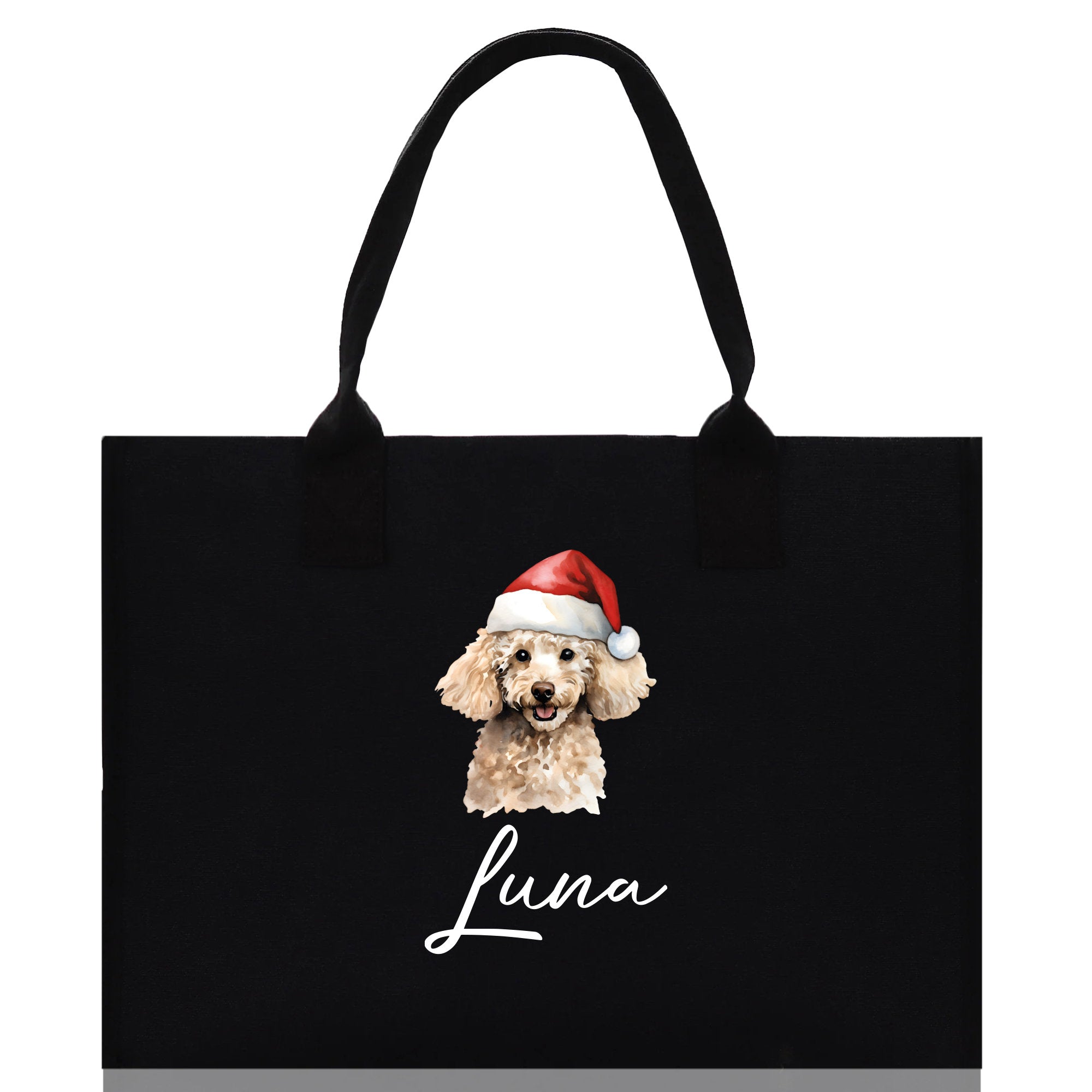 a black shopping bag with a dog wearing a santa hat