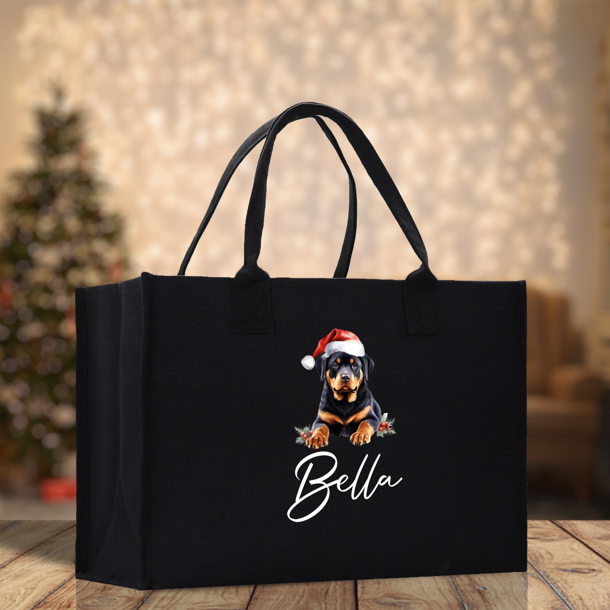 a black bag with a picture of a dog wearing a santa hat