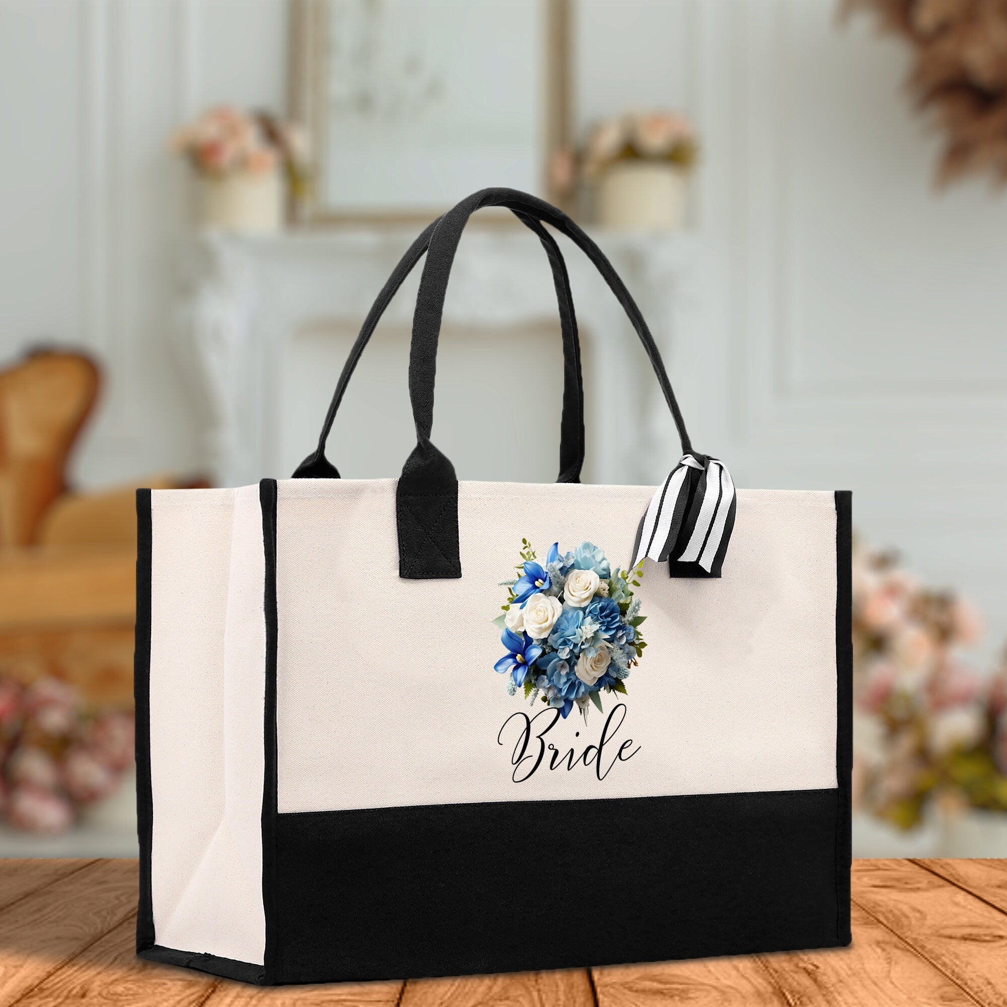 a black and white bag with a flower on it