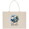 a white tote bag with a bouquet of flowers on it