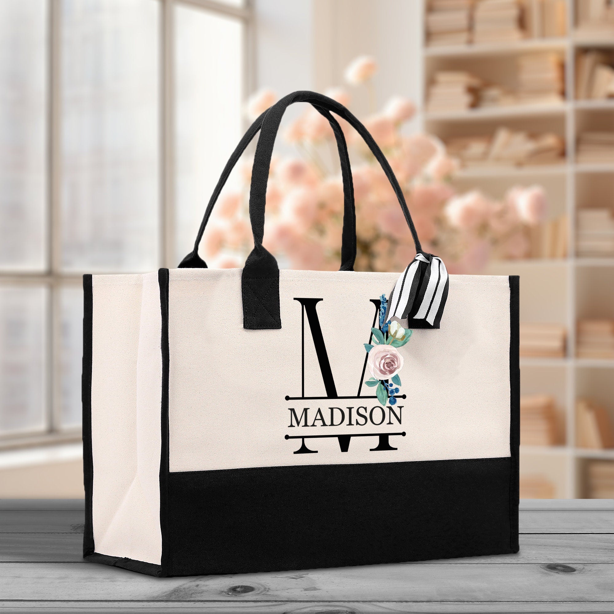 a black and white shopping bag sitting on a table