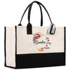 a black and white bag with a floral design