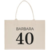a white shopping bag with the number 40 printed on it