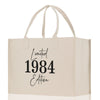a white shopping bag with black lettering on it