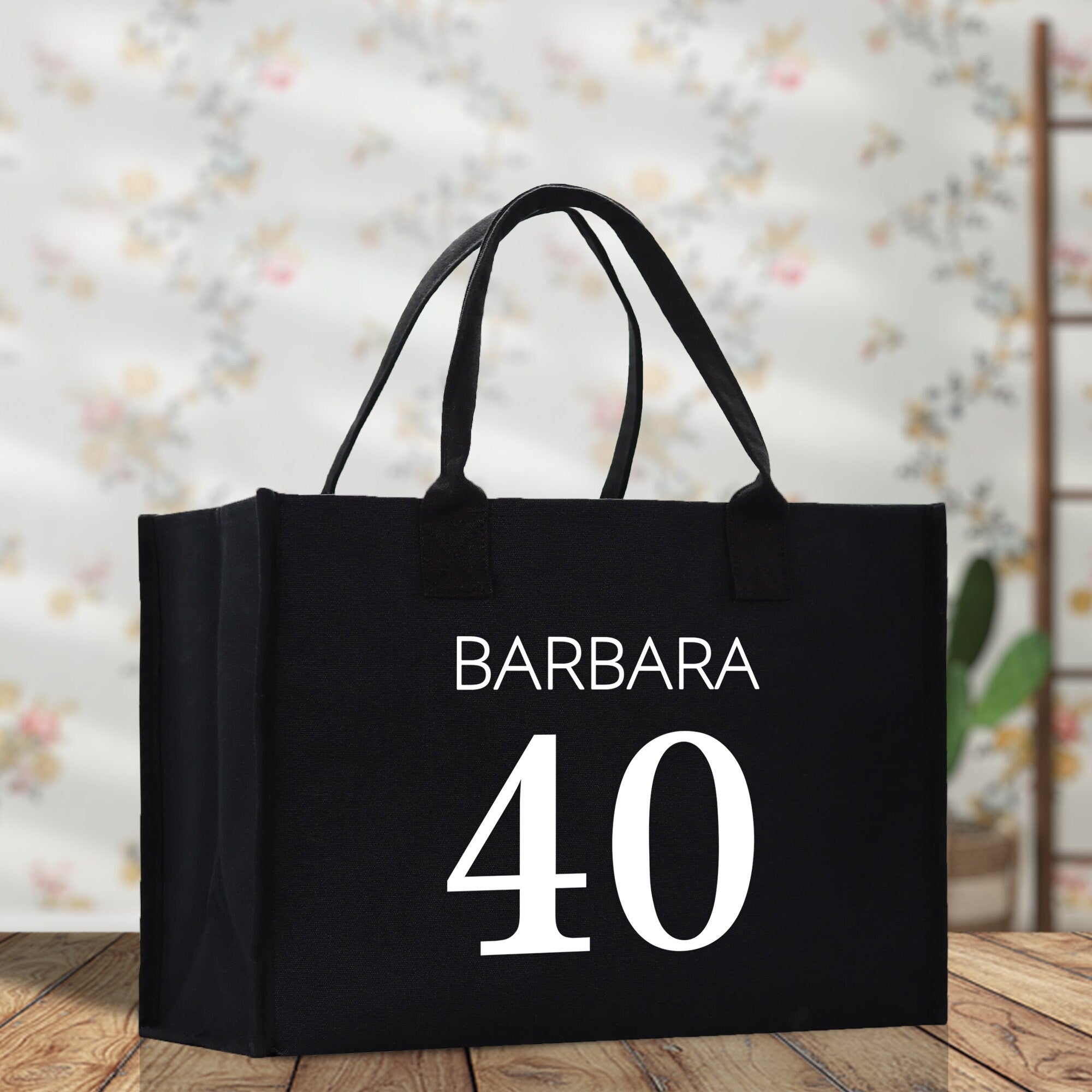 a black shopping bag with the number 40 printed on it
