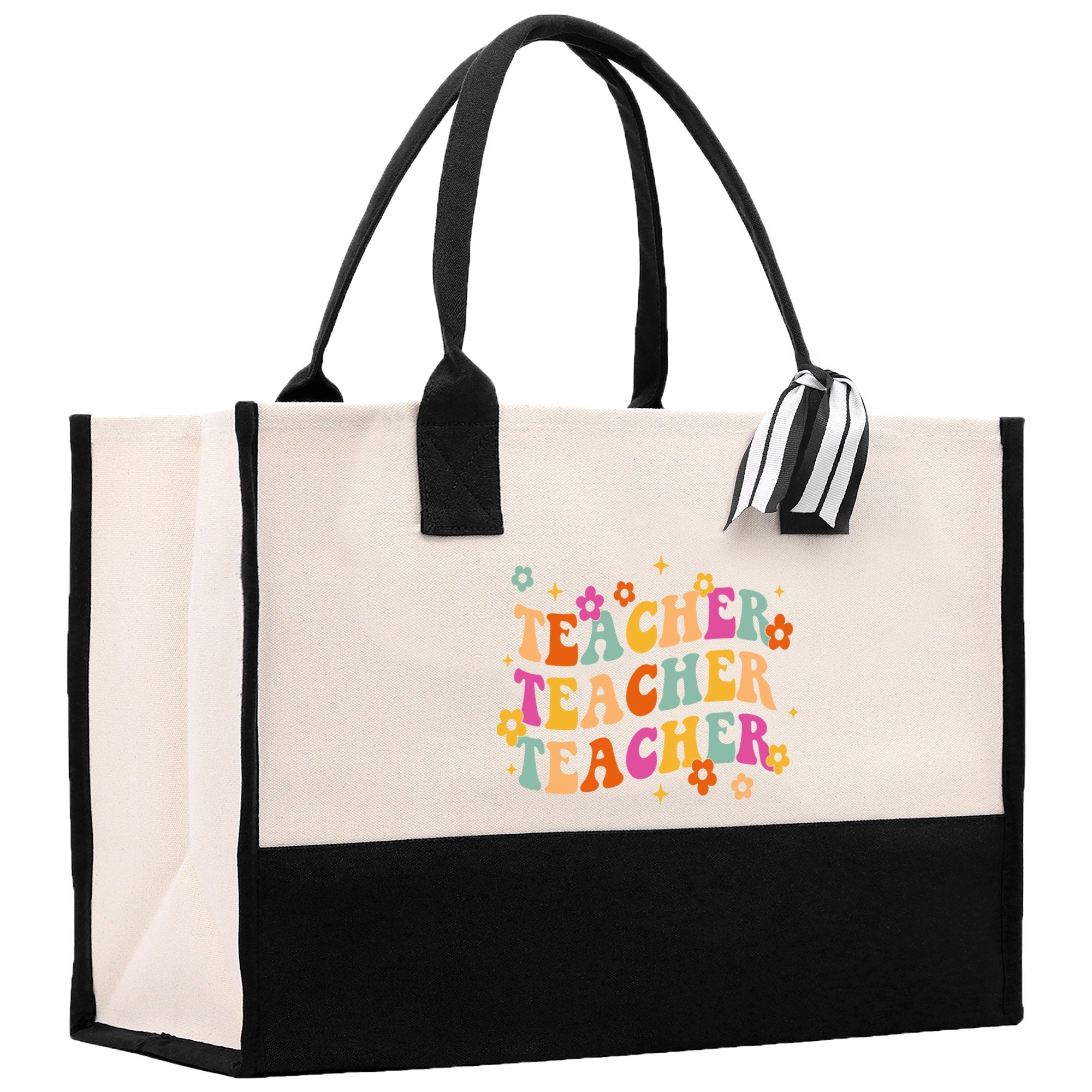 a white and black bag with a teacher&#39;s name on it