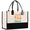 a black and white tote bag with a teacher on it
