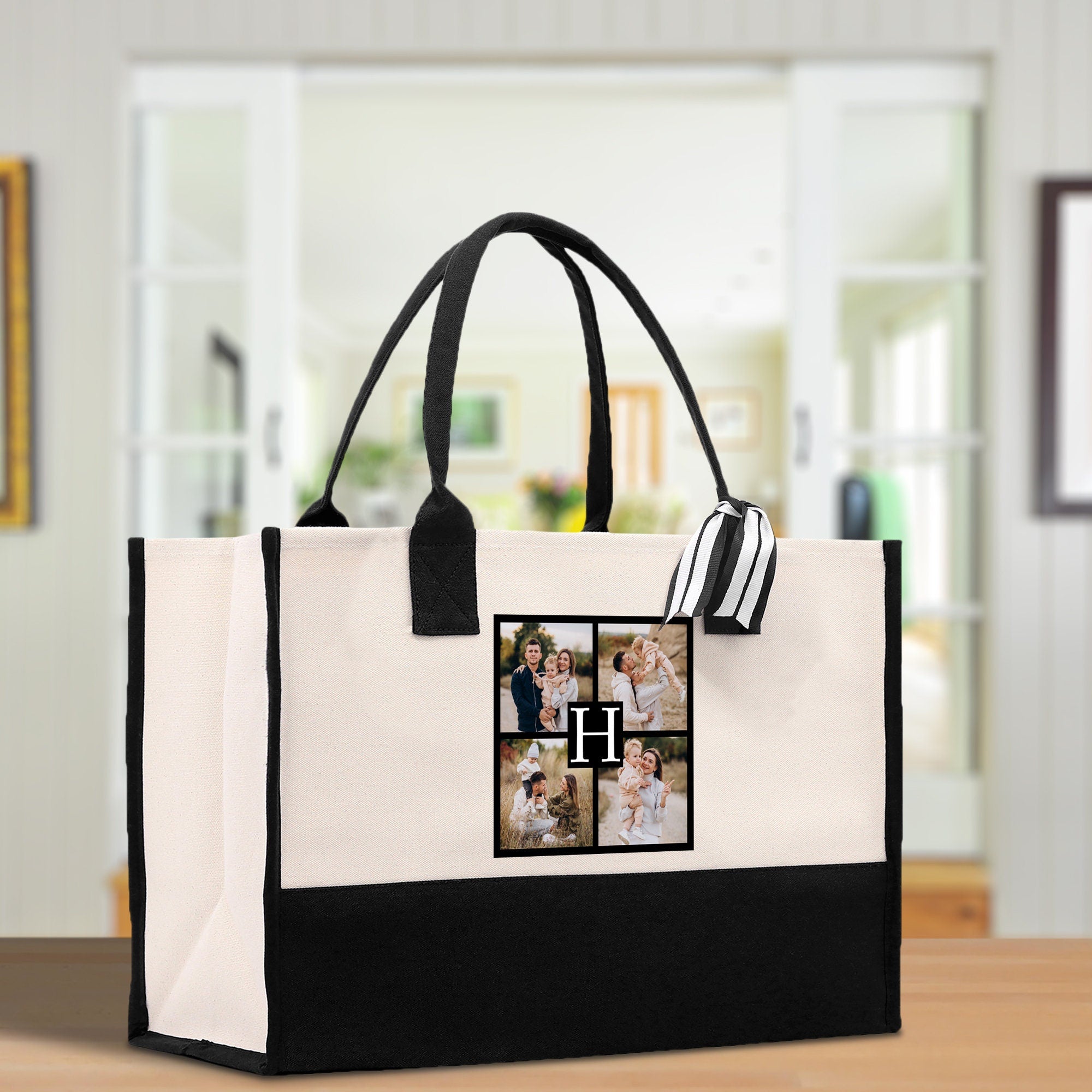 a black and white bag with a picture of a family on it