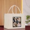 a white shopping bag with a picture of a family