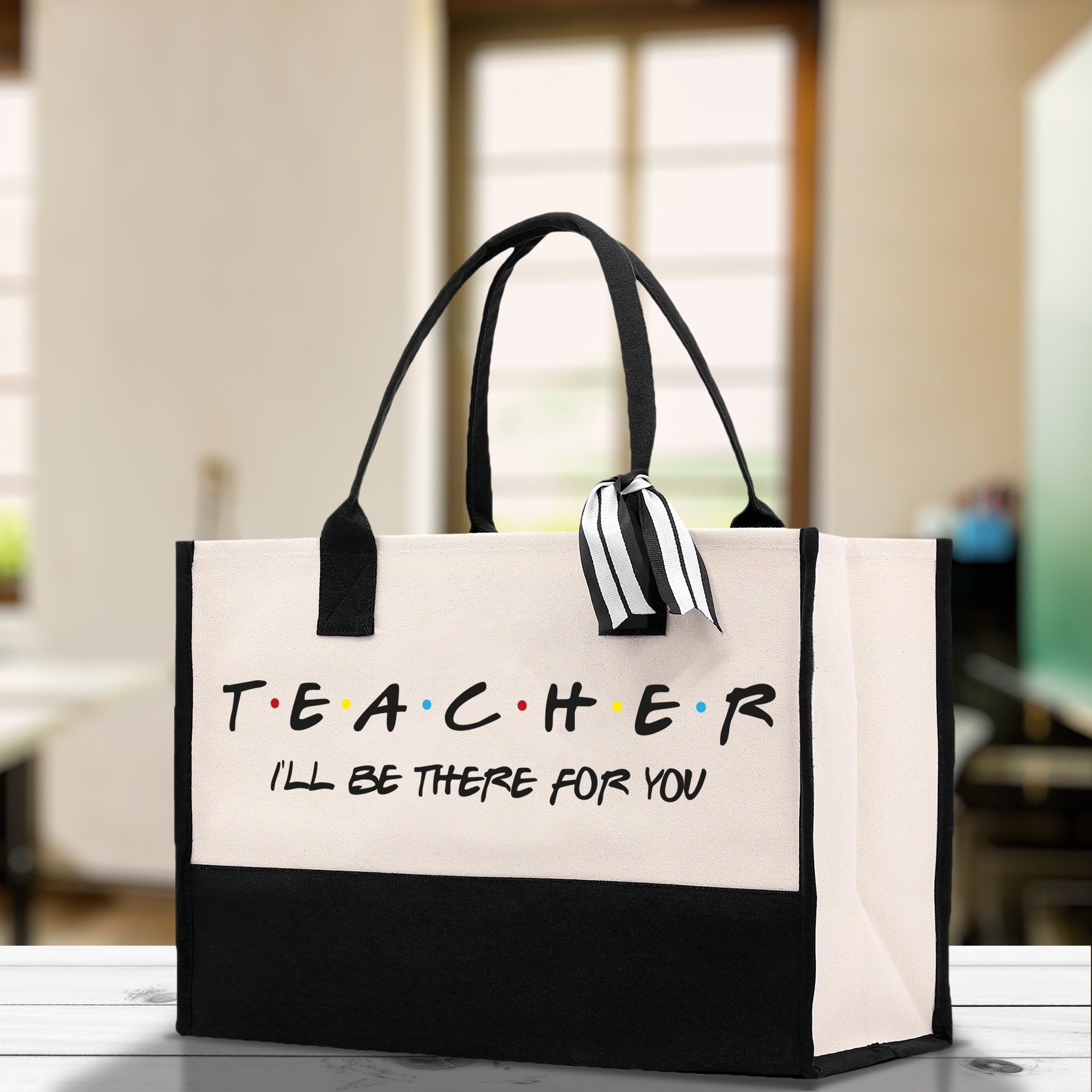 a white and black bag that says teacher i&#39;ll be there for you