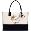 a black and white bag with a floral heart on it