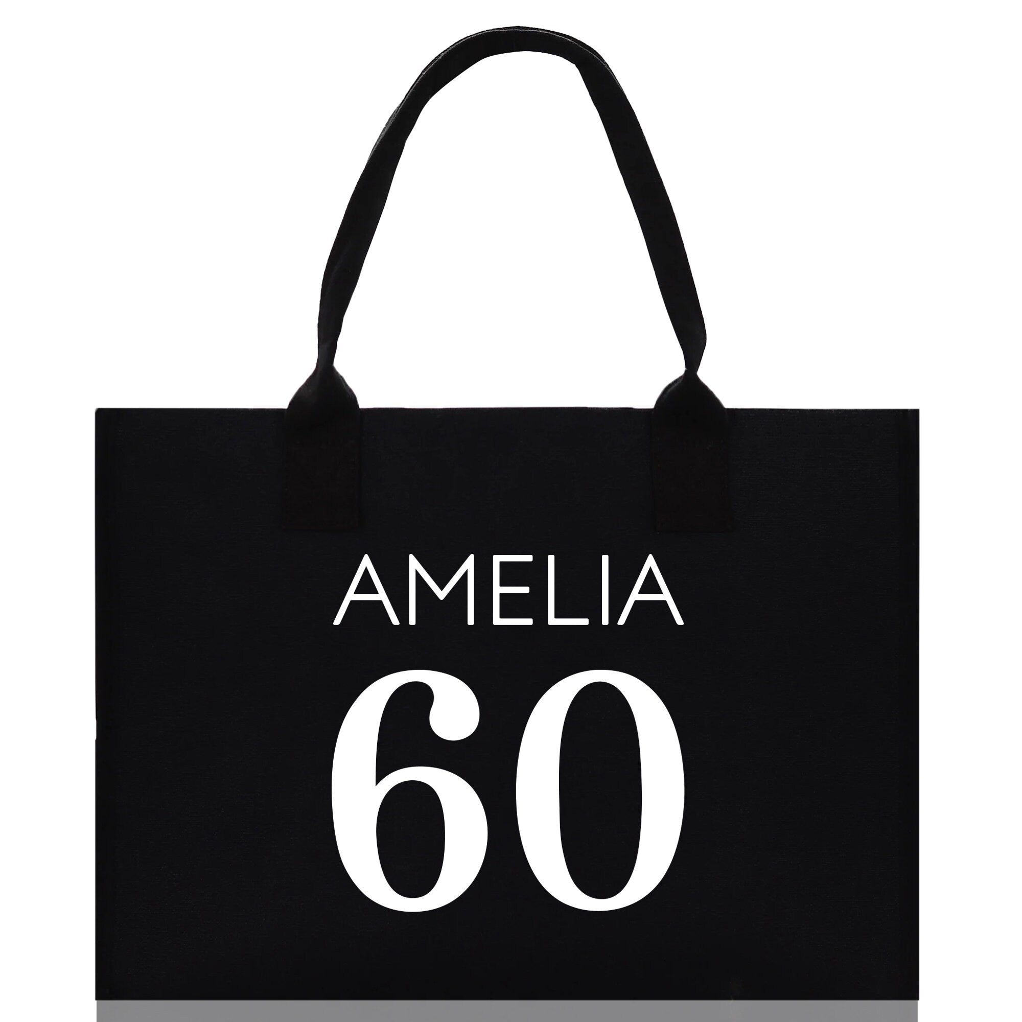a black shopping bag with the number 60 printed on it