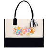 a black and white bag with a flower design