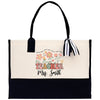 a black and white tote bag with a teacher on it