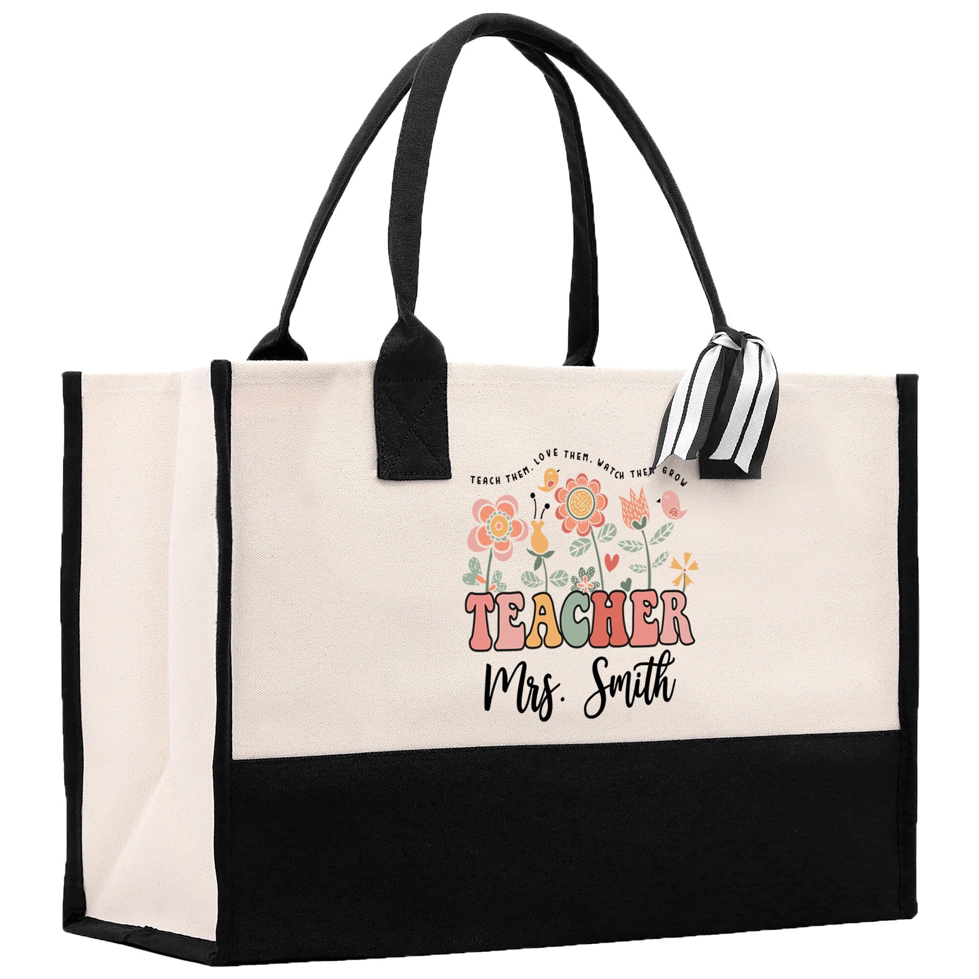 a black and white bag with a teacher&#39;s name on it