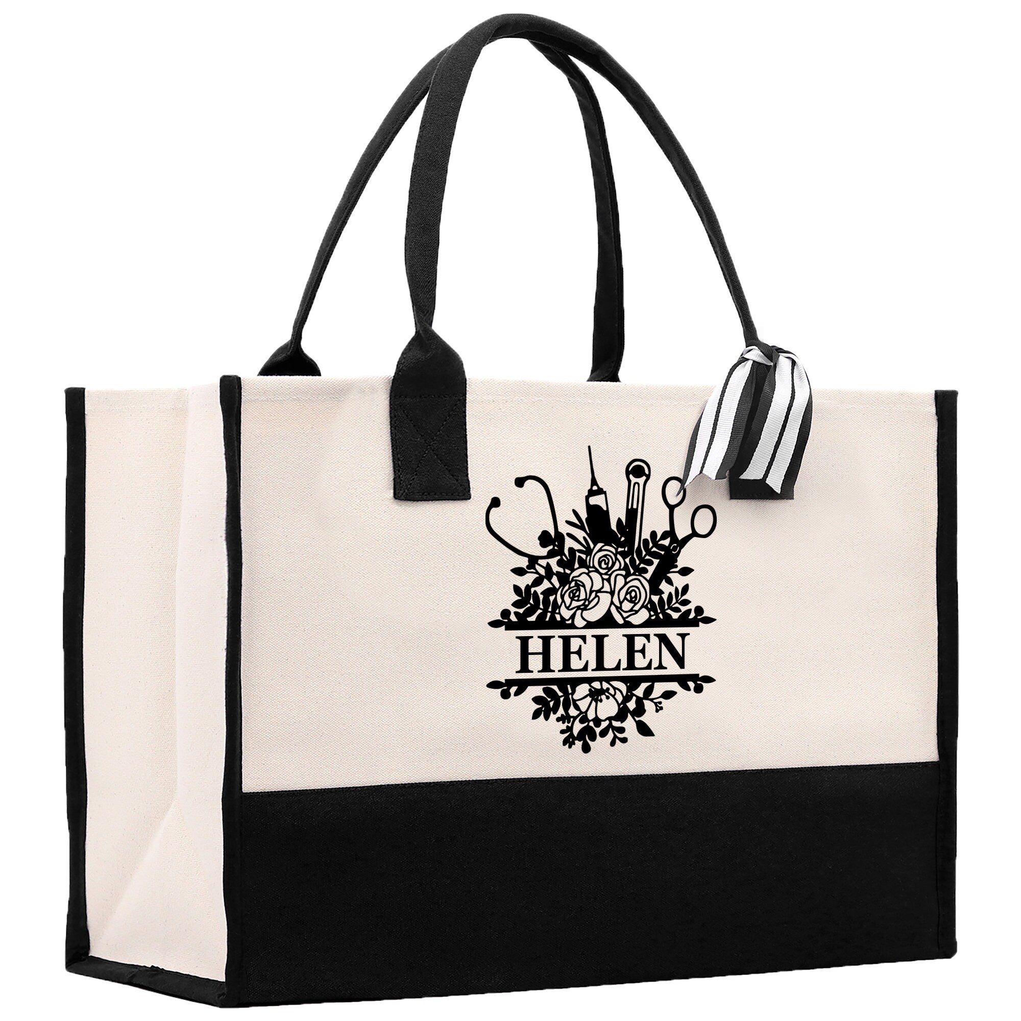 a black and white tote bag with scissors on it