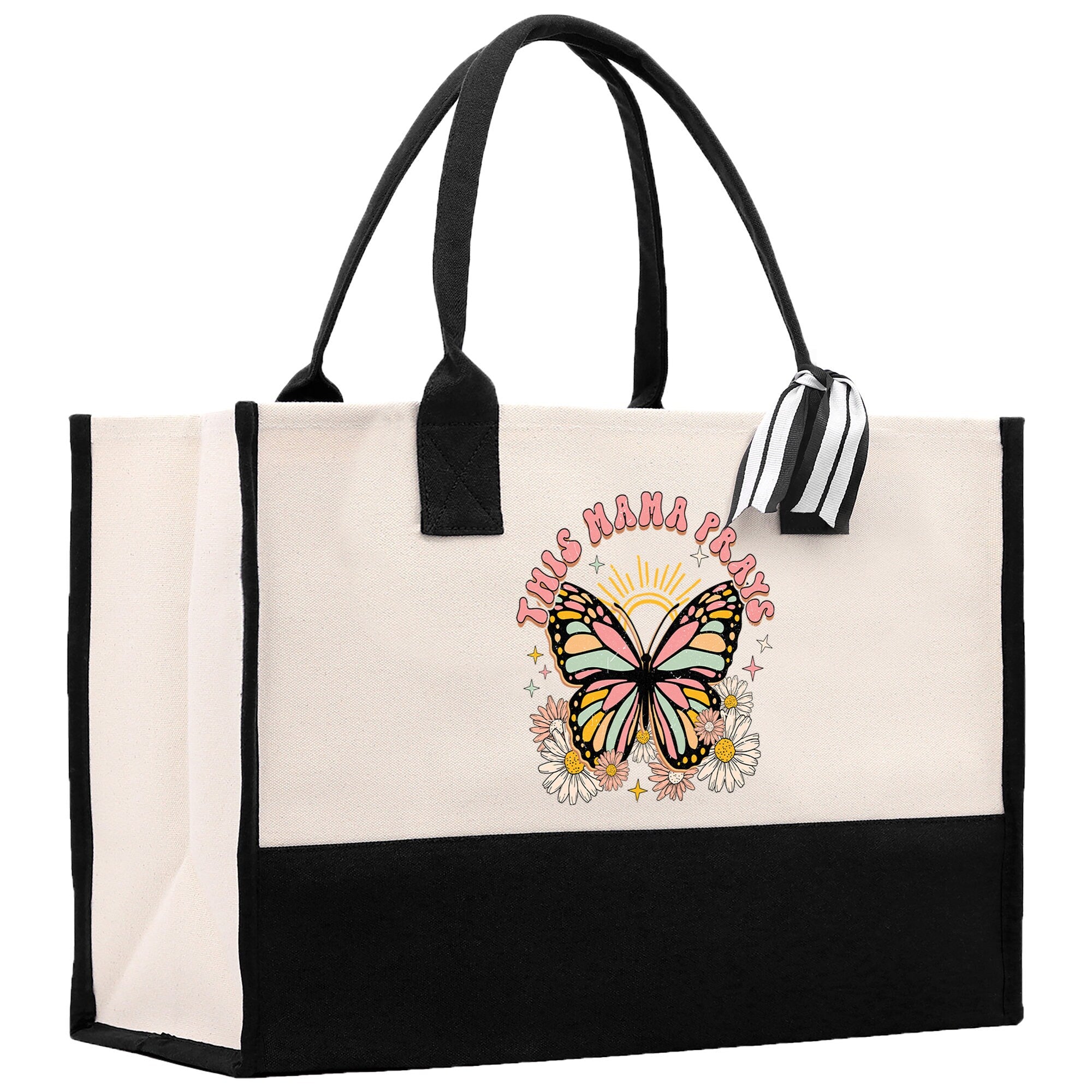 a white and black bag with a butterfly on it