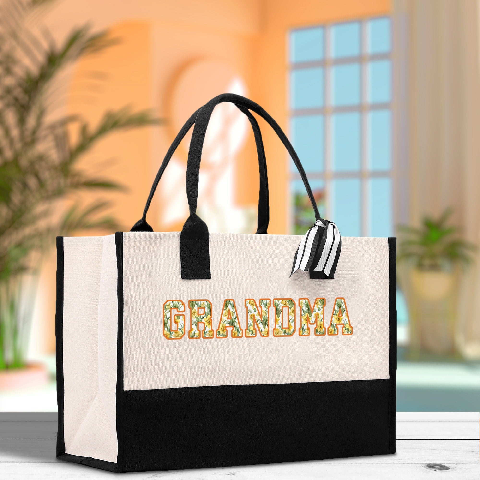 a black and white bag with the word grandma printed on it