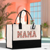 a black and white bag with the word mama printed on it