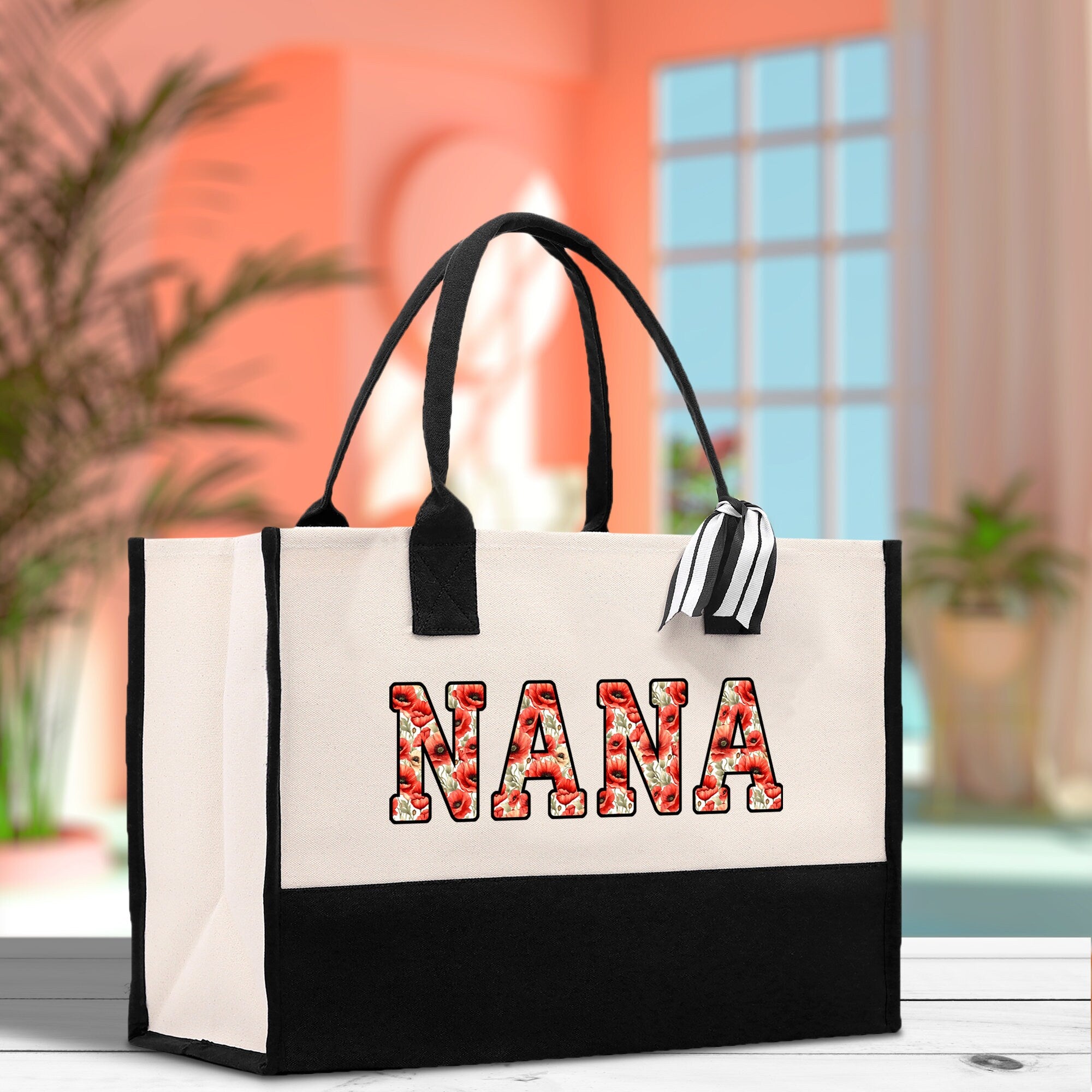 a black and white bag with the word nana on it