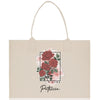 a shopping bag with a picture of roses on it