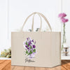 a white bag with purple flowers on it