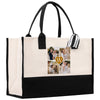 a black and white tote bag with a picture of a family