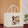 a white shopping bag with a picture of a couple on it