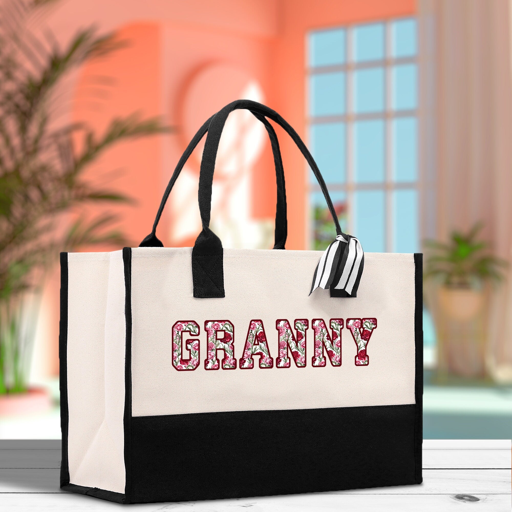 a black and white bag with the word granny on it