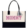 a white and black bag with the word mommy printed on it