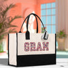 a black and white bag with the word gram on it