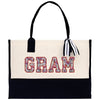 a black and white bag with the word gam printed on it