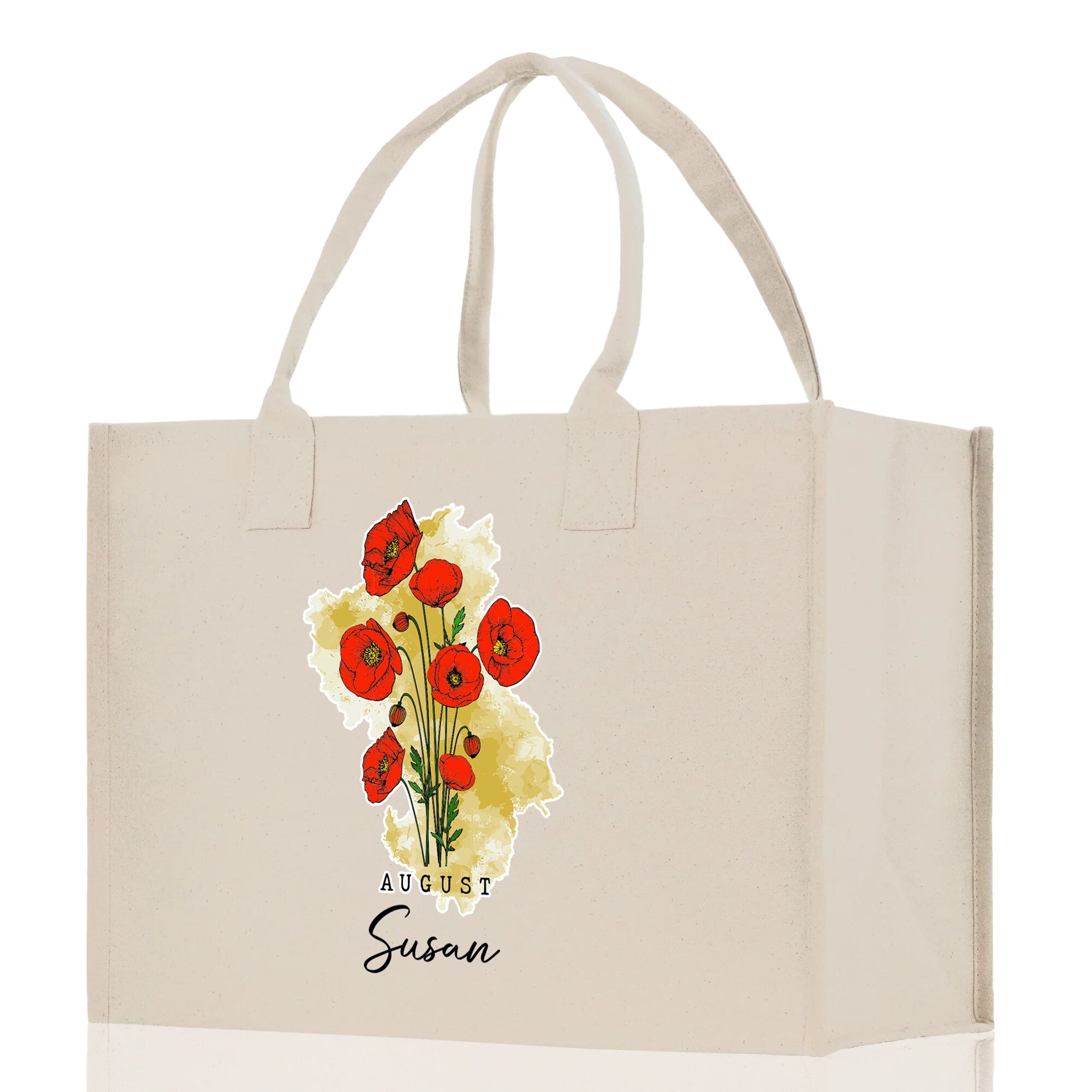 a white shopping bag with red flowers on it