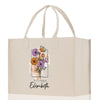 a white shopping bag with a picture of flowers on it