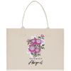 a tote bag with a bouquet of flowers on it