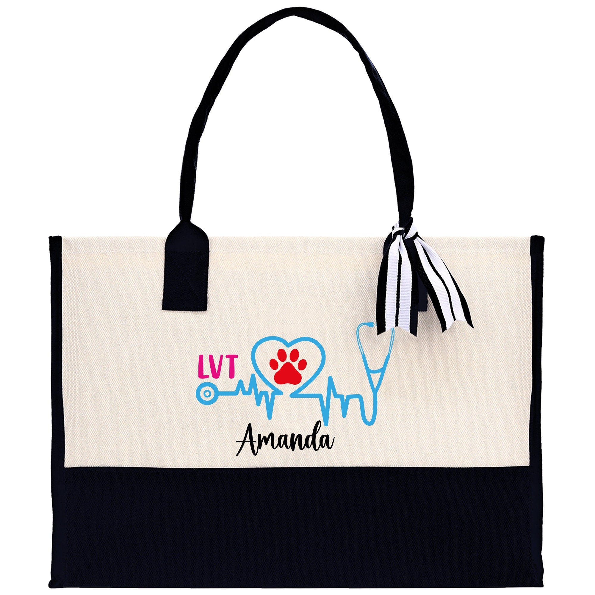 a white and black bag with a dog&#39;s name on it