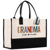 a black and white tote bag with the word grandma printed on it