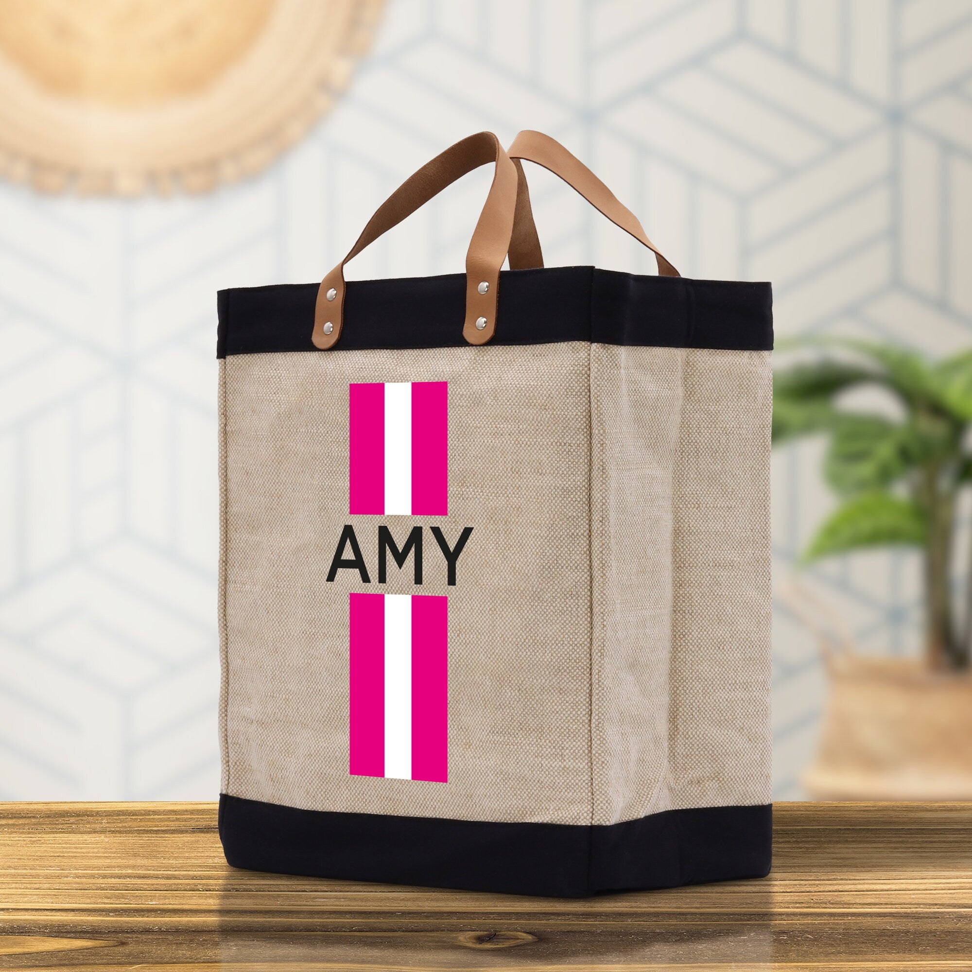 a bag with a pink and white stripe on it