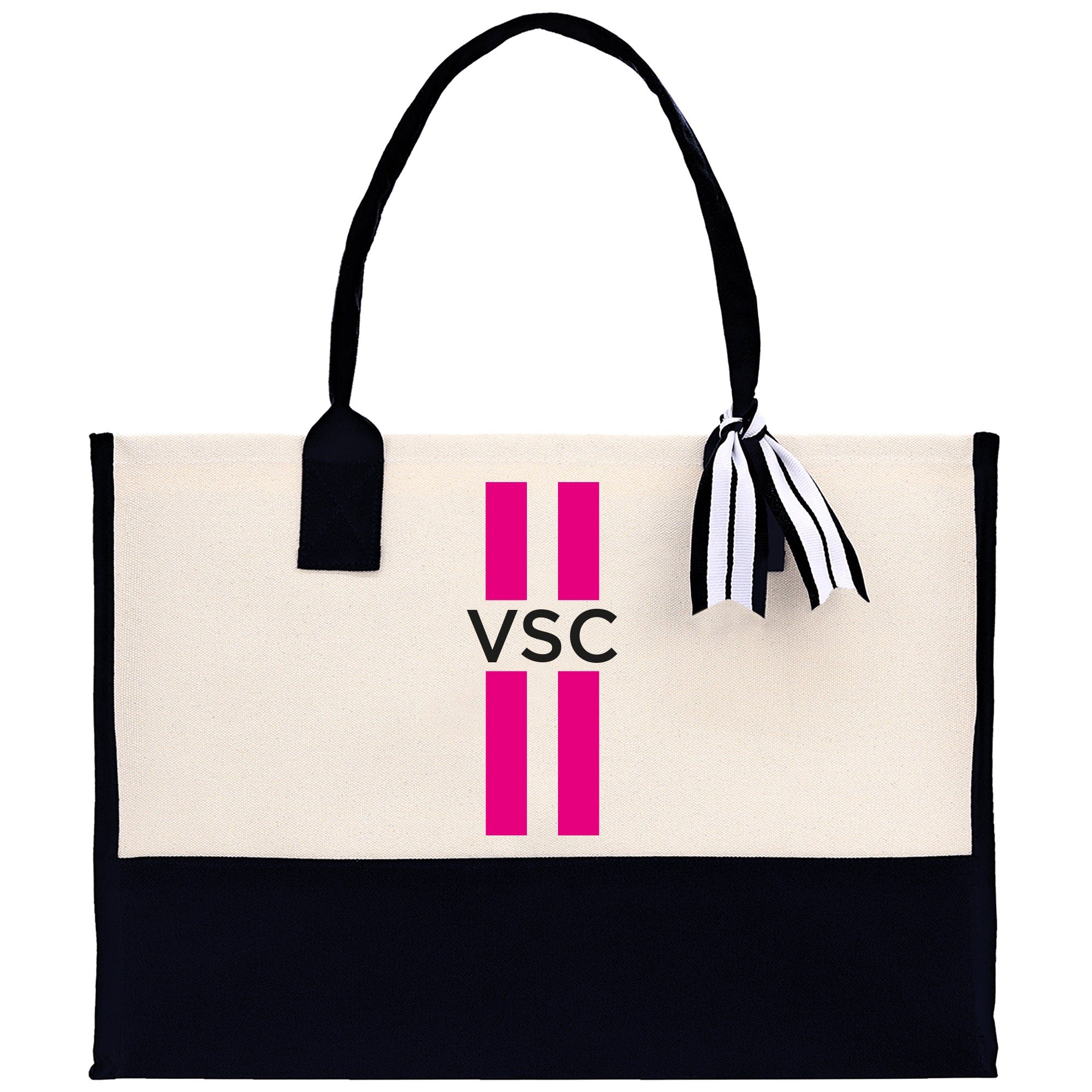 a black and white bag with a pink and black stripe