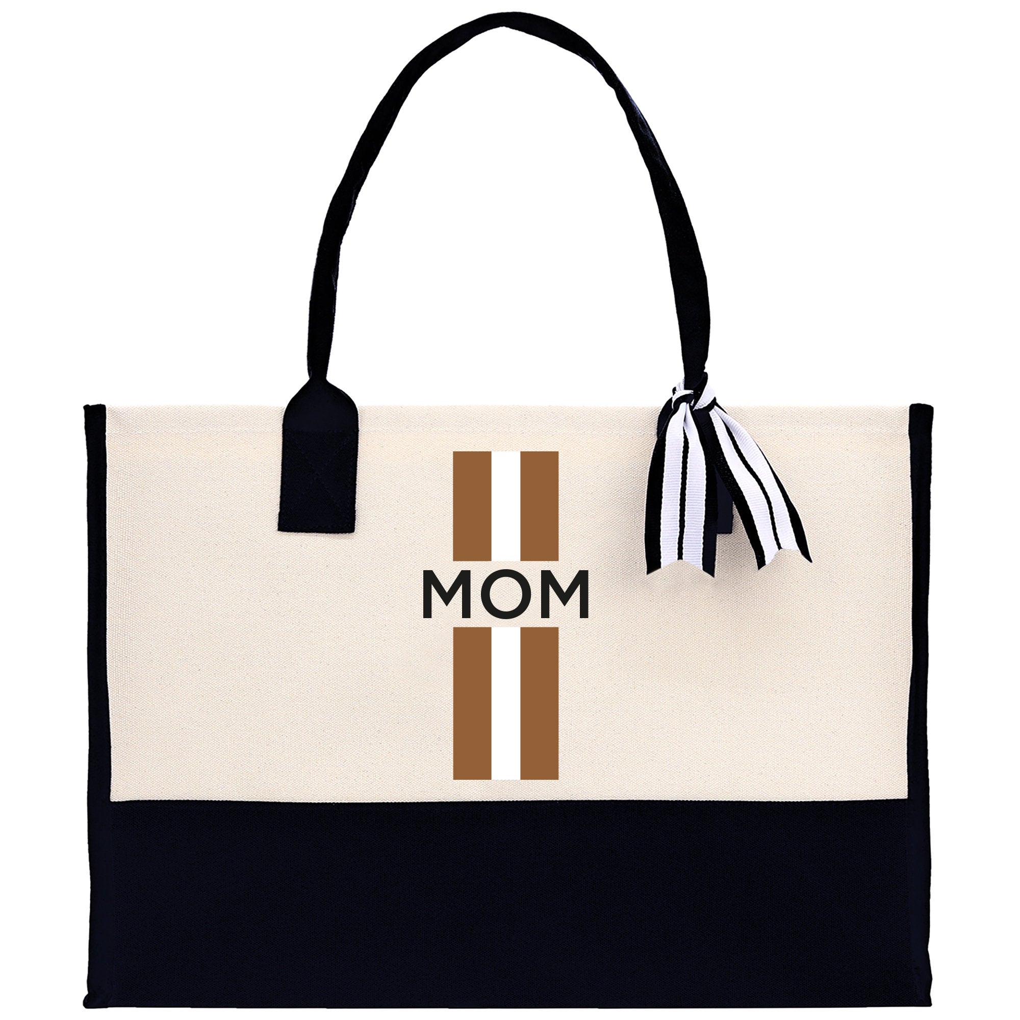 a mom&#39;s tote bag with a tassel hanging from it