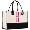 a black and white bag with a pink stripe