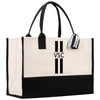 a black and white tote bag with a black and white stripe