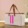 a canvas bag with pink and white stripes